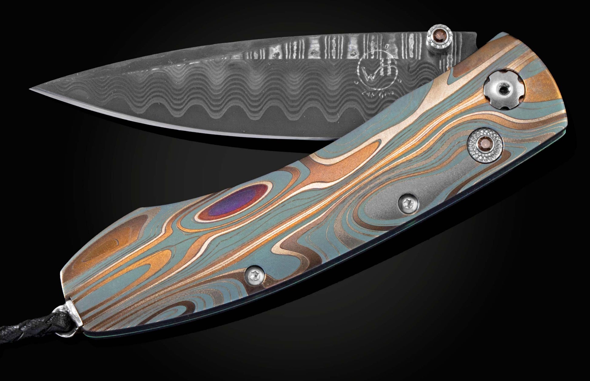 Handcrafted pocket knife from William Henry features a frame in laser engraved and anodized titanium, set with smoky quartz gemstones and a Damascus steel blade.