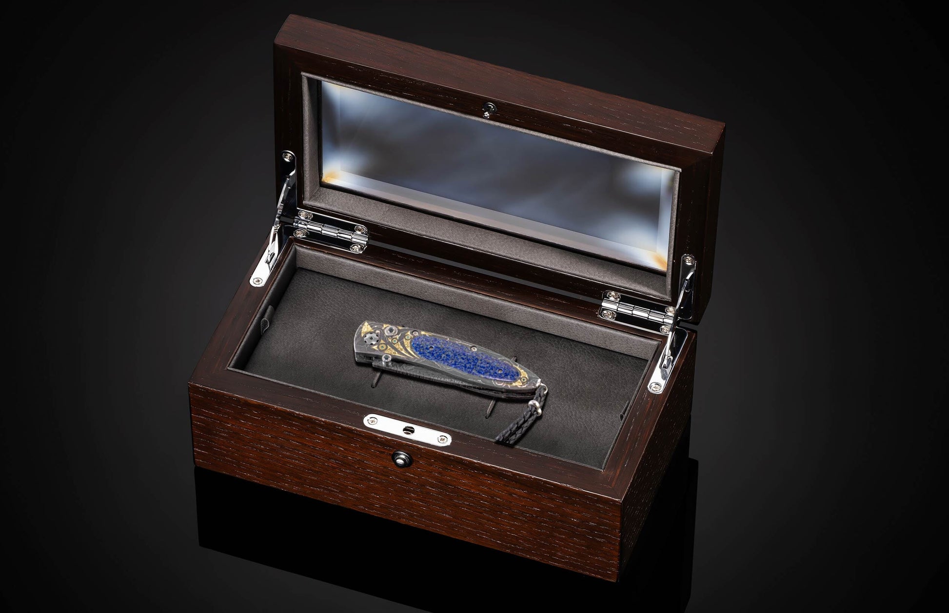  hand-engraved 14K gold inays and blue diamonds by Kristof Som