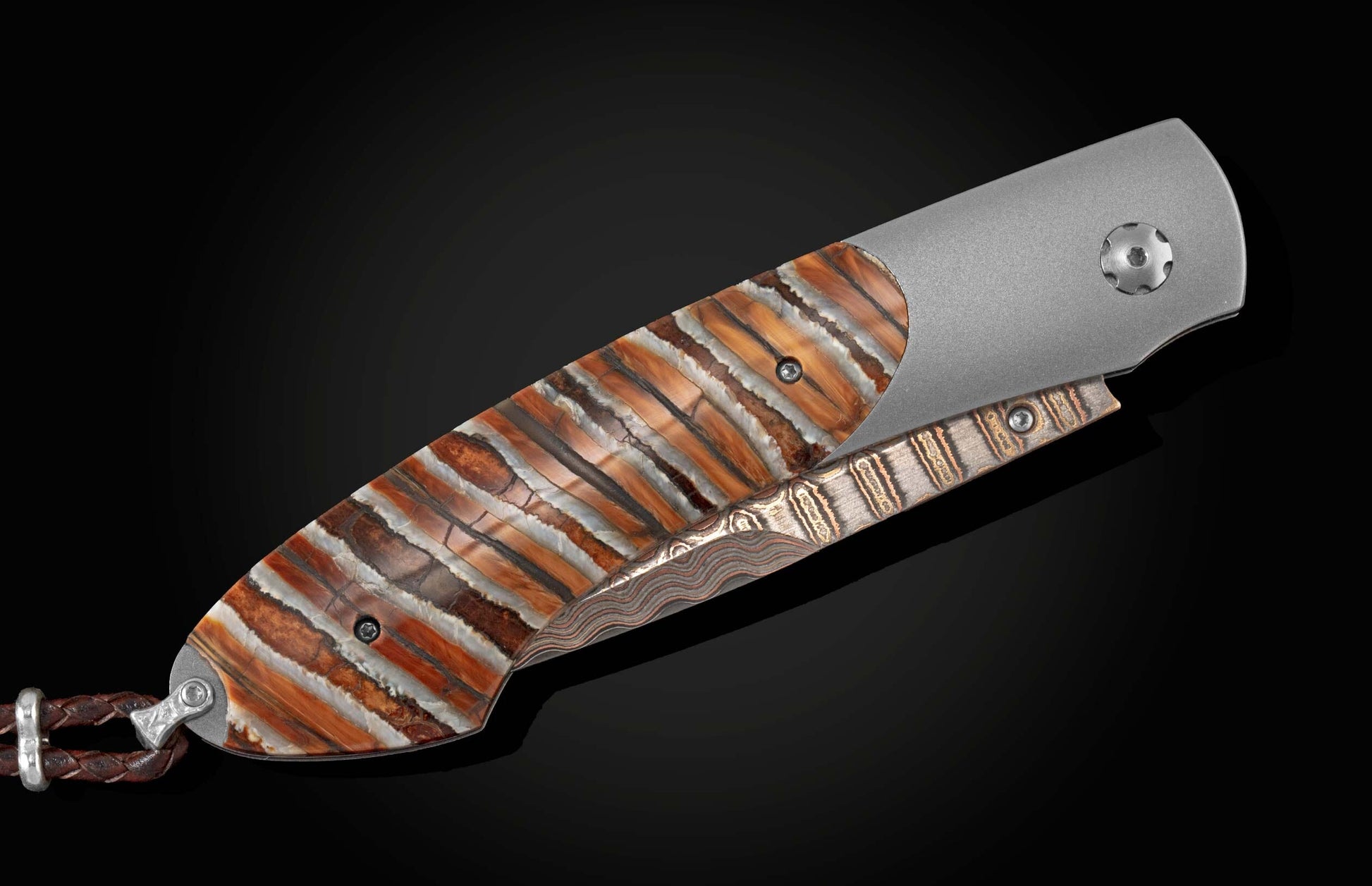  and a hand forged Damascus steel blade.