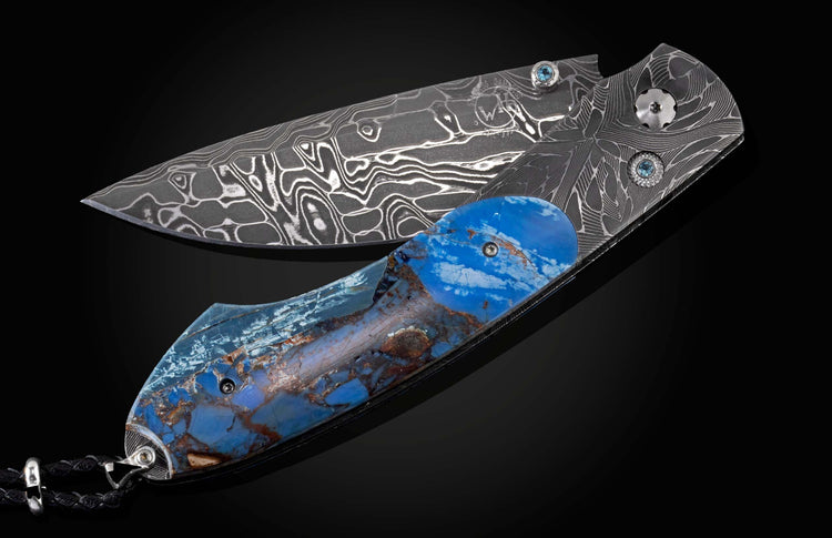 The Blue Fusion Pocketknife featuring Etched Damascus and Fossil Mammoth Tusk