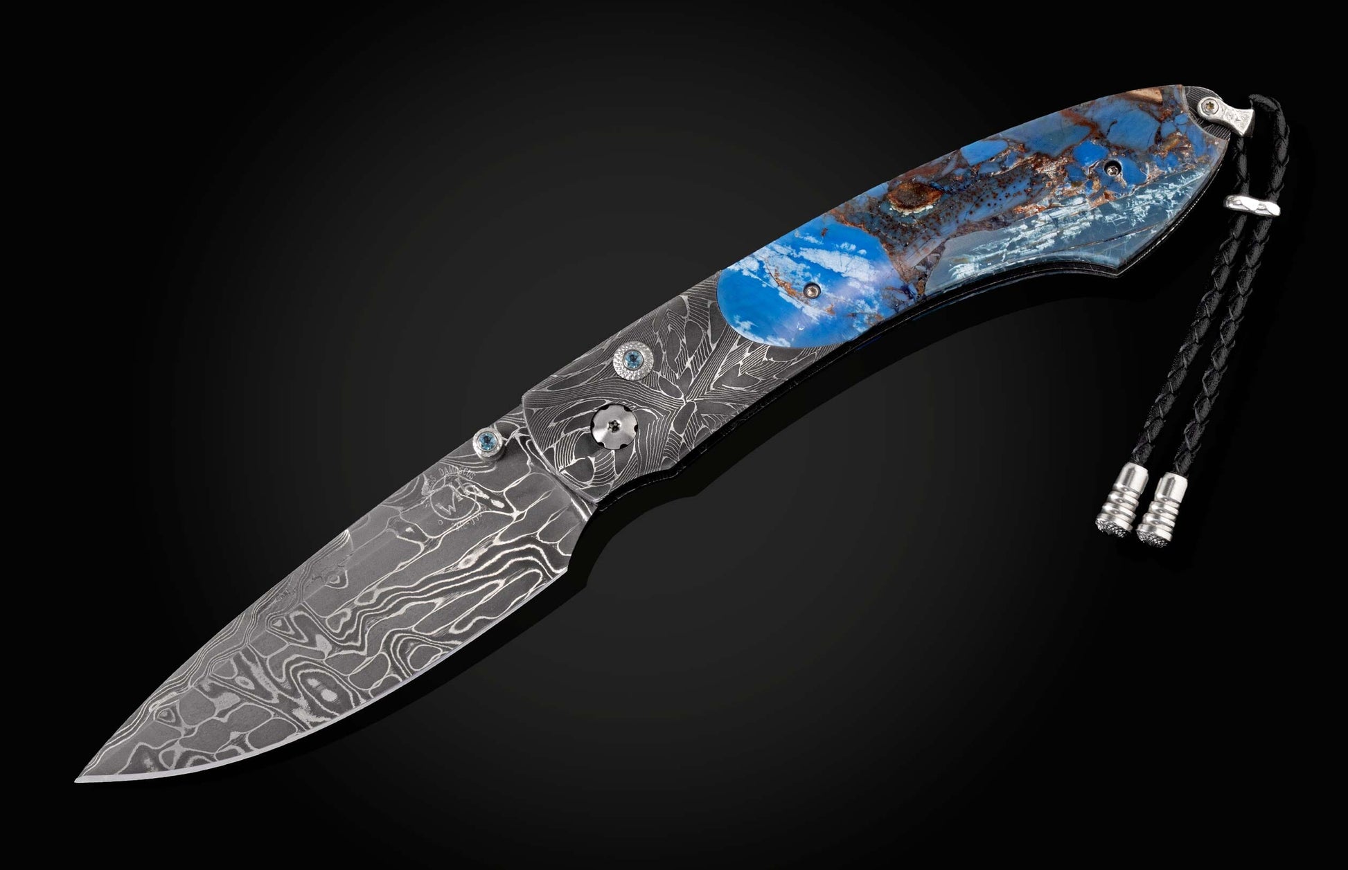 The Blue Fusion Pocketknife featuring Etched Damascus and Fossil Mammoth Tusk