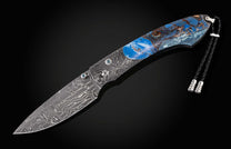 The Blue Fusion Pocketknife featuring Etched Damascus and Fossil Mammoth Tusk