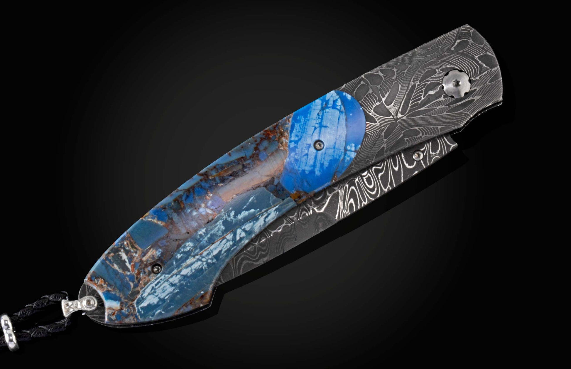 The Blue Fusion Pocketknife featuring Etched Damascus and Fossil Mammoth Tusk