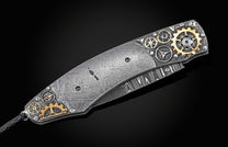  and a hand-forged meteorite Damascus blade by Ken Largin