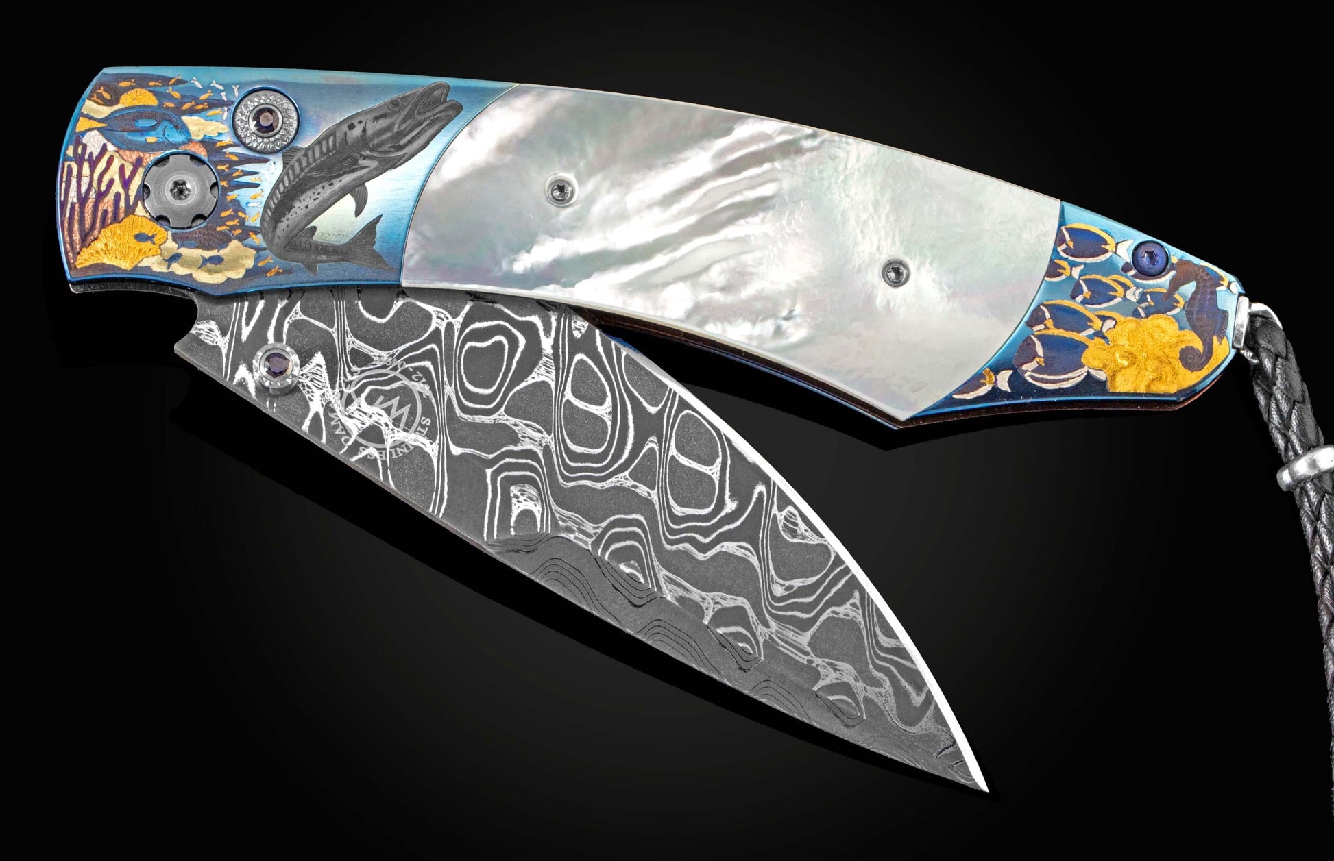 William Henry custom knife depicting sea life in an anodized hand-engraved titanium frame with 24K gold, 16K gold, and silver inlays by Matyas Balazs, mother of pearl scales, sapphires, and hand-forged damascus steel blade by Chad Nichols
