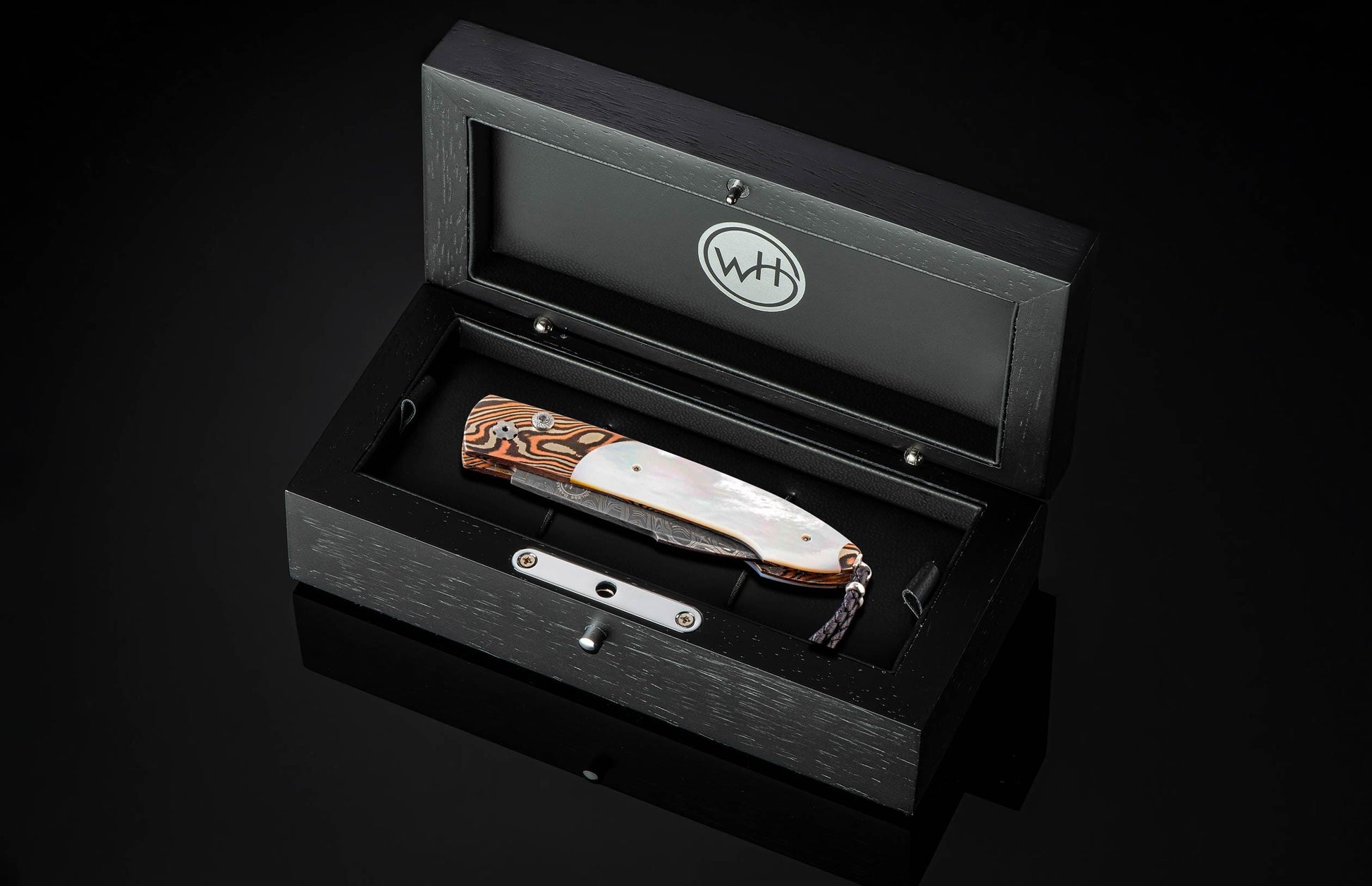 Handcrafted William Henry automatic knife with hand forged mokume gane by Mike Sakmar