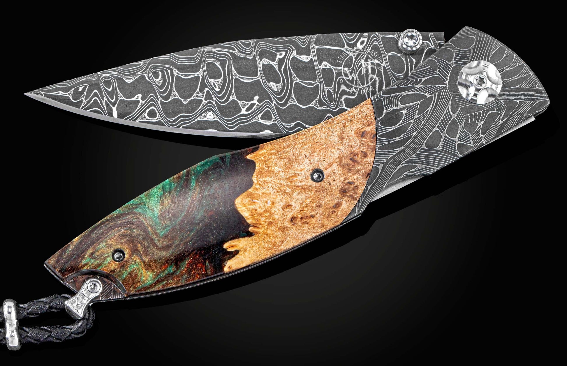 Handcrafted William Henry knife with hand-forged damascus steel frame by Chad Nichols, inlaid with wood and resin, white topaz gem stones and hand-forged damascus steel blade, also by Chad Nichols