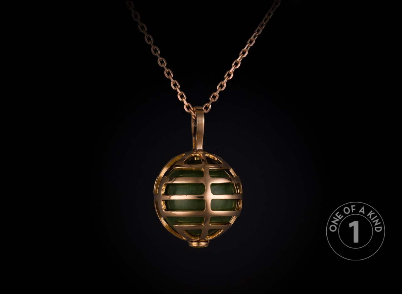 One of a kind pendant necklace from William Henry featuring 18K Red gold and a jade bead