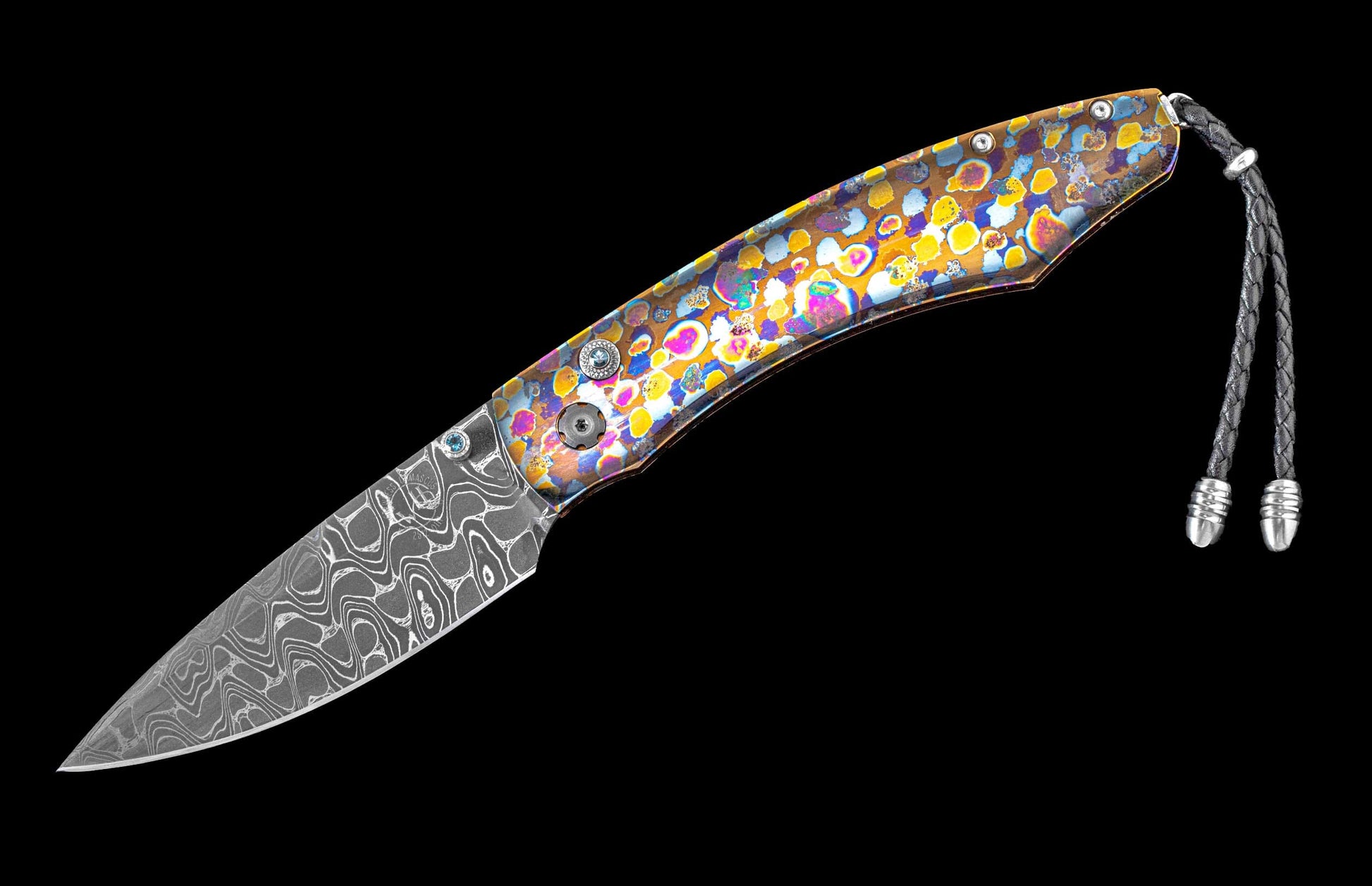 Brightly colored one of a kind William Henry knife featuring a laser colored titanium frame and hand forged damascus steel blade