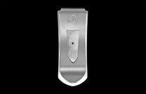 Handcrafted luxury money clip from William Henry featuring hand-carved sterling silver inlaid with Gibeon meteorite scales.