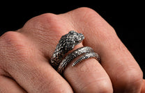 A Sculpted Sterling Silver Snake Ring on a finger